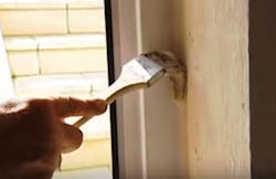 Tooling%20caulk%20with%20a%20paint%20brush Tooling%20caulk%20with%20a%20paint%20brush